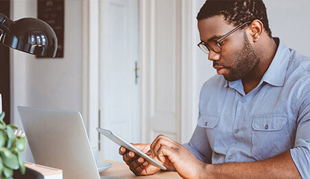 male student working on a tablet