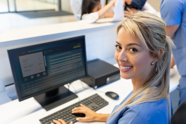 A woman attends an online class