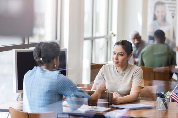 A female veteran meets with a career advisor