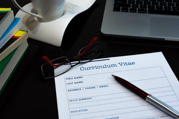 A curriculum vitae paper on a desk