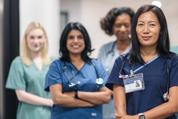 A diverse group of nurses represents the changing makeup of the United States.
