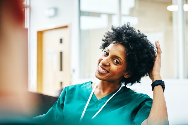A nurse relaxes during a break