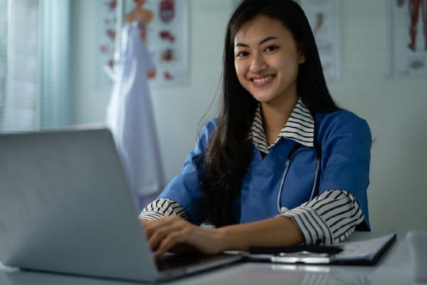 A nursing student prepares to connect with a patient to deliver telehealth