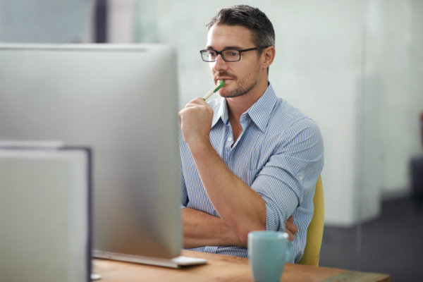 Man looking at laptop computer