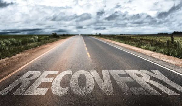 The word Recovery on a road