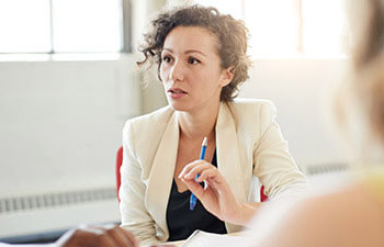 woman leading a meeting