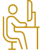 student at desk icon