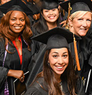 Purdue Global graduates in caps and gowns