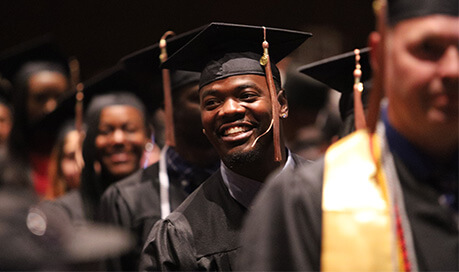 Caps and Gowns for Purdue Global Graduation