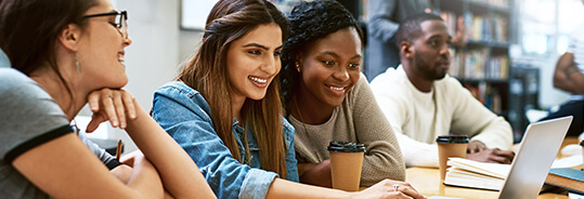 group of students working on a laptop